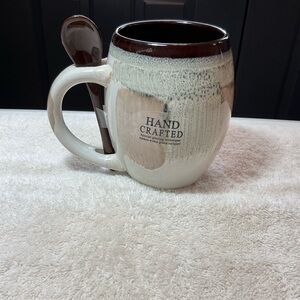 Handcrafted Artisan Ceramic Mug with Spoon part of the “My Cafe” brand.